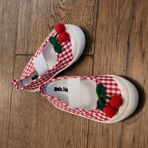Red gingham slip-on shoea